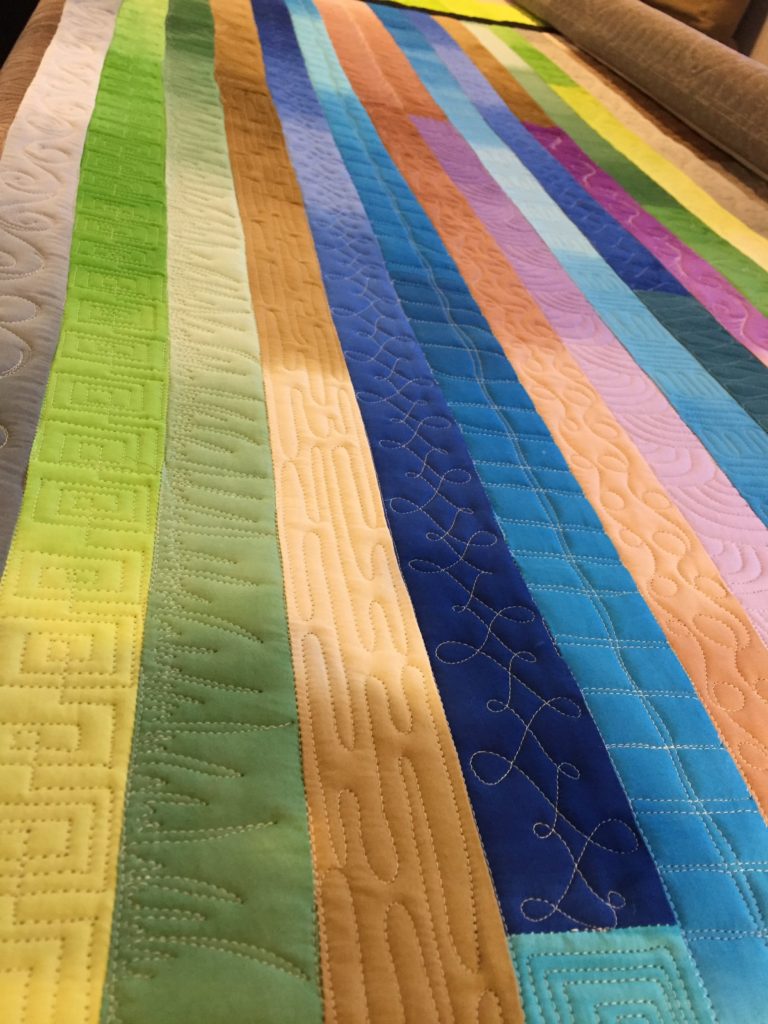 Quilting a Jelly Roll Race the Fun Way • Dizzy Quilter