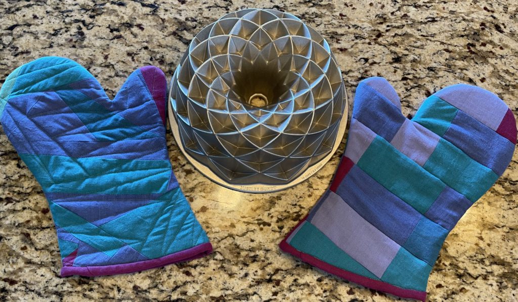 Scrappy oven mitts with Accuquilt's new Oven Mitt Die. 
